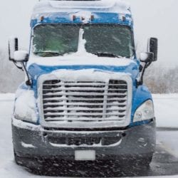 a truck following our winter driving tips